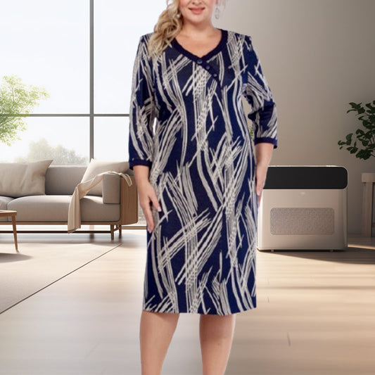 Elegancka damska sukienka z abstrakcyjnym nadrukiem i rękawami 3/4