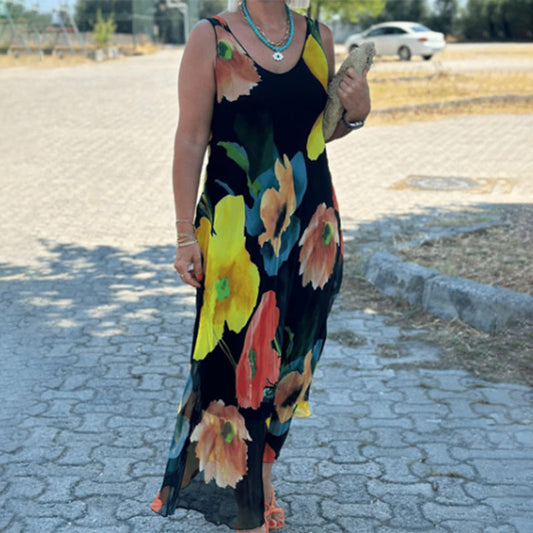 Elegancka miękka sukienka bez rękawów w kwiaty z falbankami
