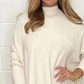 Damski sweter z nieregularnym golfem z dzianiny w stylu casual