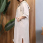👗 Elegancka sukienka oversize z kapturem - długie rękawy i trendowe rozcięcie