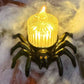 Halloweenowa świeczka LED z przerażającym pająkiem